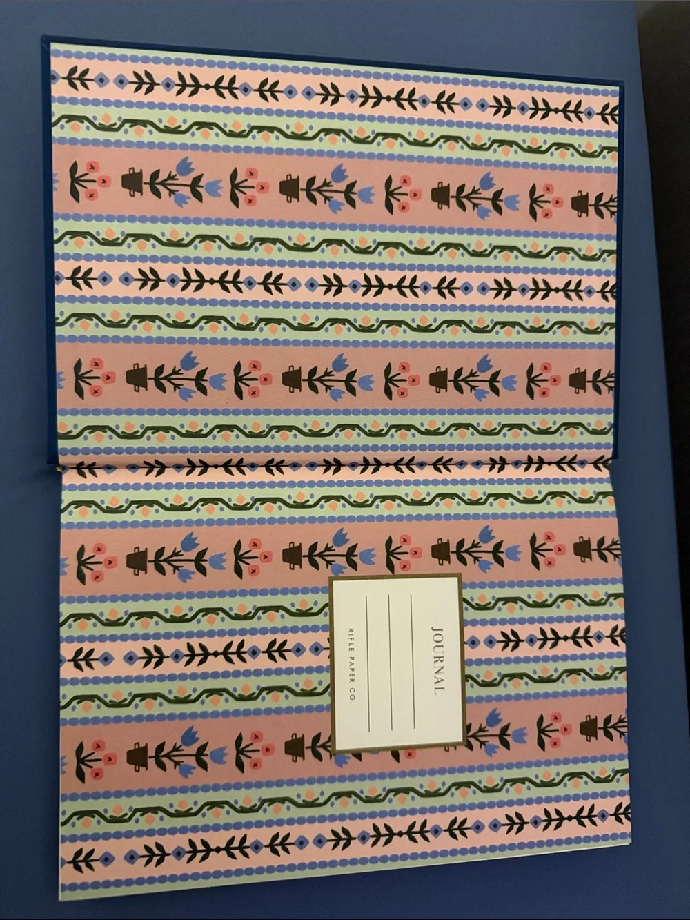 Rifle Paper Co. Navy Hardcover Journal with Colorful Stacked Book Illustration